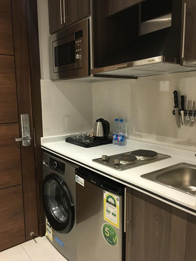 Aparthotel Alagneha Almokmalia -Alnahdah à DDjeddah Extérieur photo